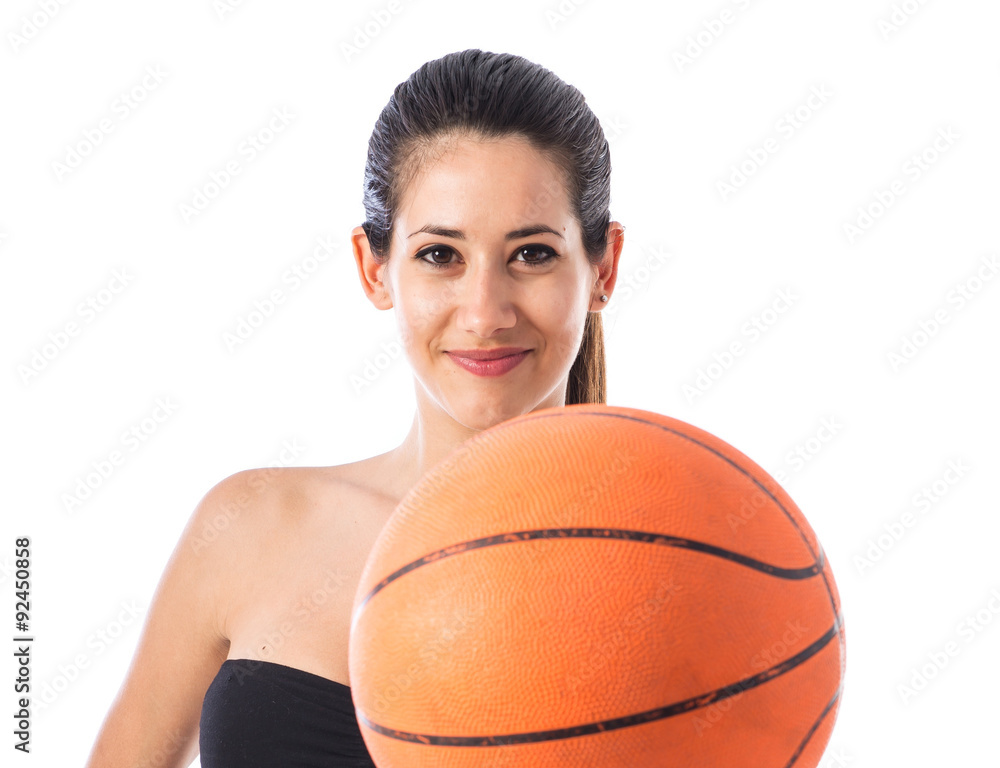 Woman playing baktetball