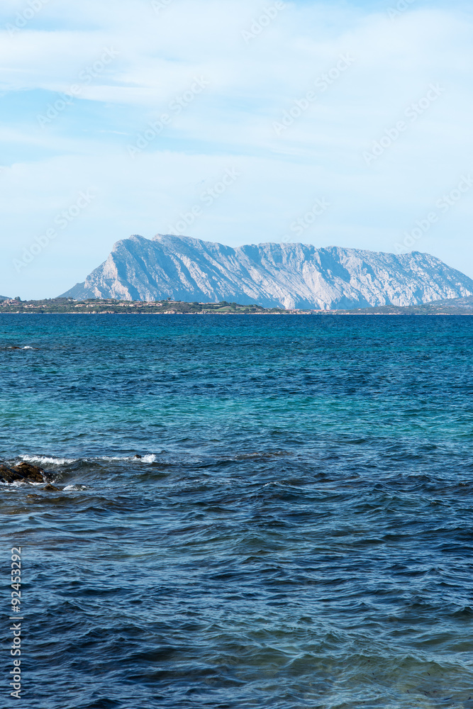 Sardinia coast in evening sunlight.