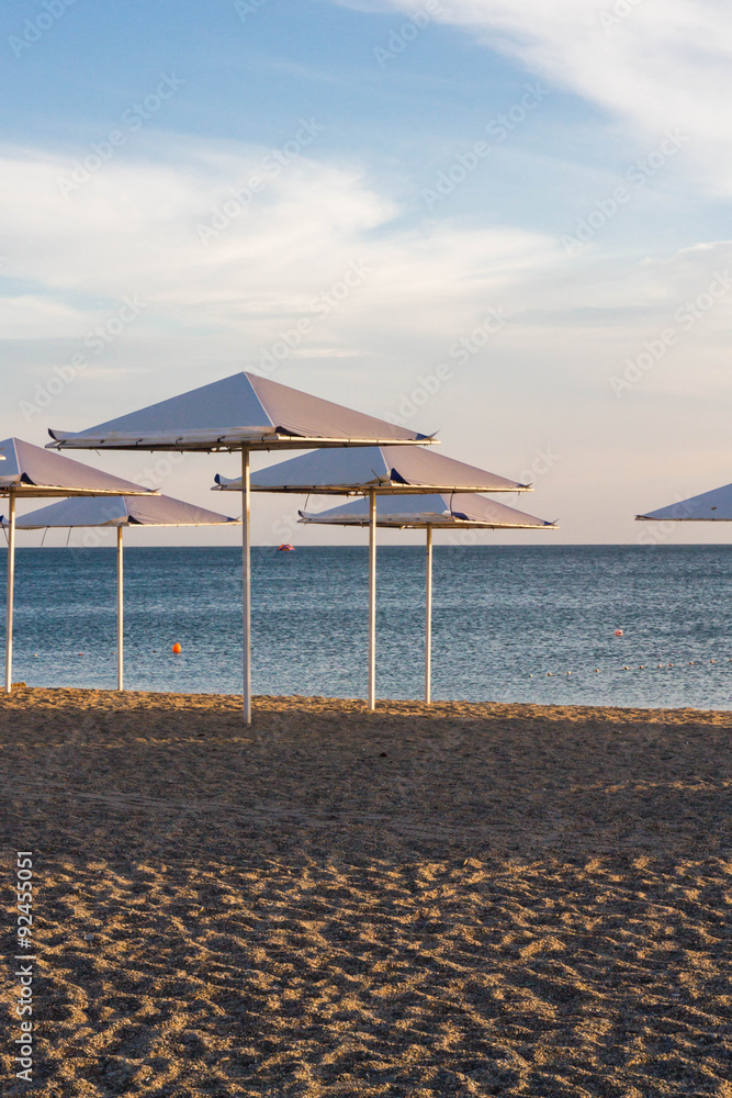 Fototapeta premium Umbrellas on the beach on the black sea