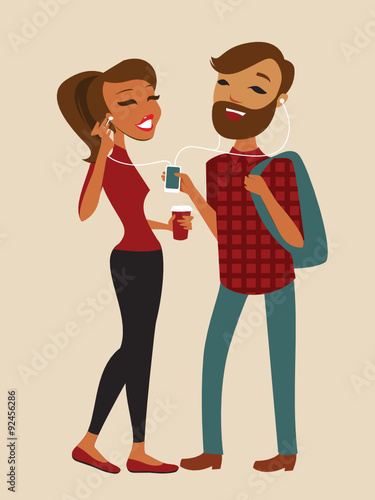 Young hipster couple istening to music together