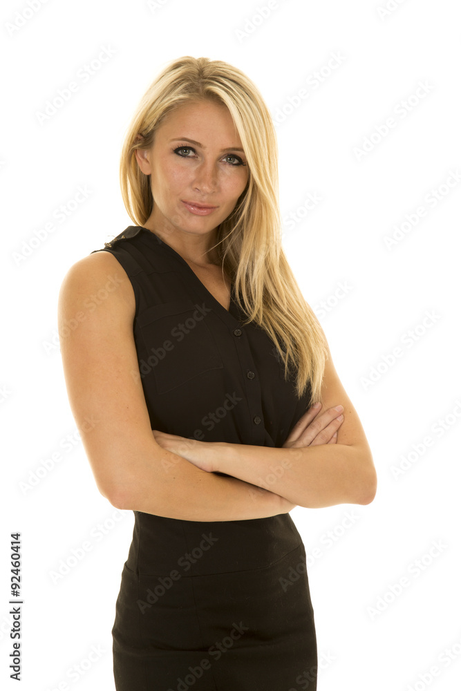 blond woman black business dress arms folded serious blond woman black business dress arms folded serious