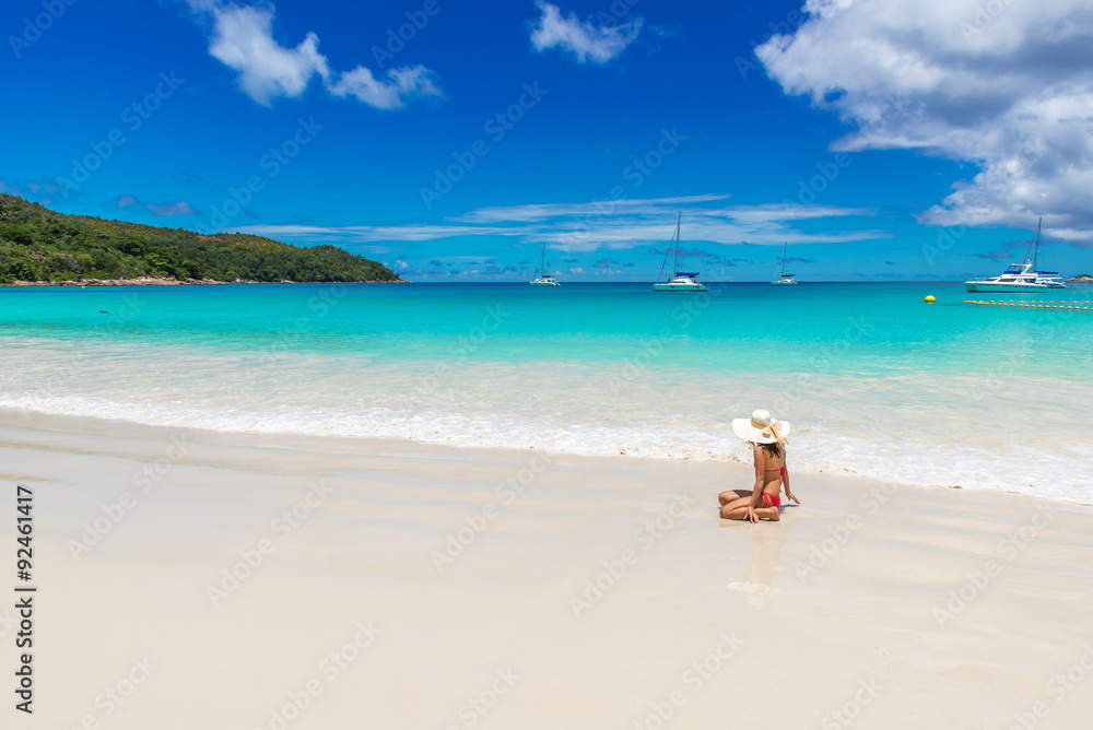 Girl at Anse Lazio - Paradise beach in Seychelles, tropical island Praslin Girl at Anse Lazio - Paradise beach in Seychelles, tropical island Praslin