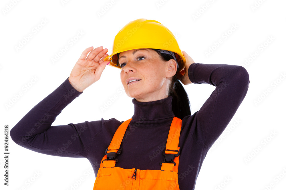 Beautiful woman builder dressing yellow helmet.Isolated Beautiful woman builder dressing yellow helmet.Isolated
