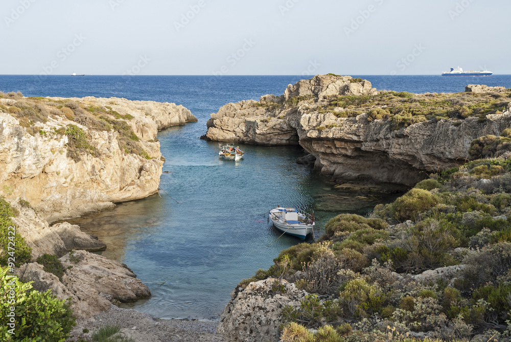Traditional wooden boats in narrow gulf in Peloponnese, Greece