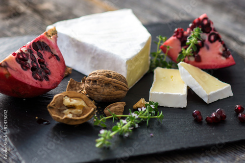 Camembert with nuts and pomegranate