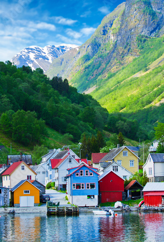 Village and Sea view on mountains in Geiranger fjord, Norway photo