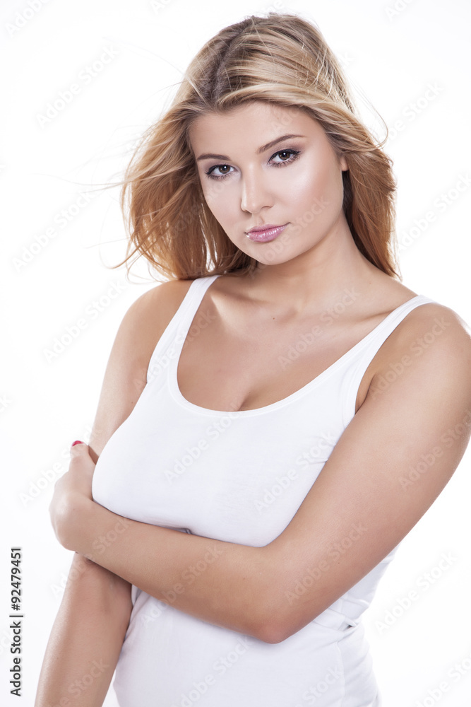 Young slim sexy woman in white sweater isolated on white backgro Young slim sexy woman in white sweater isolated on white backgro