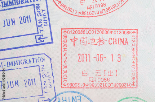 Photography China visa passport stamp on Canadian passport close-up