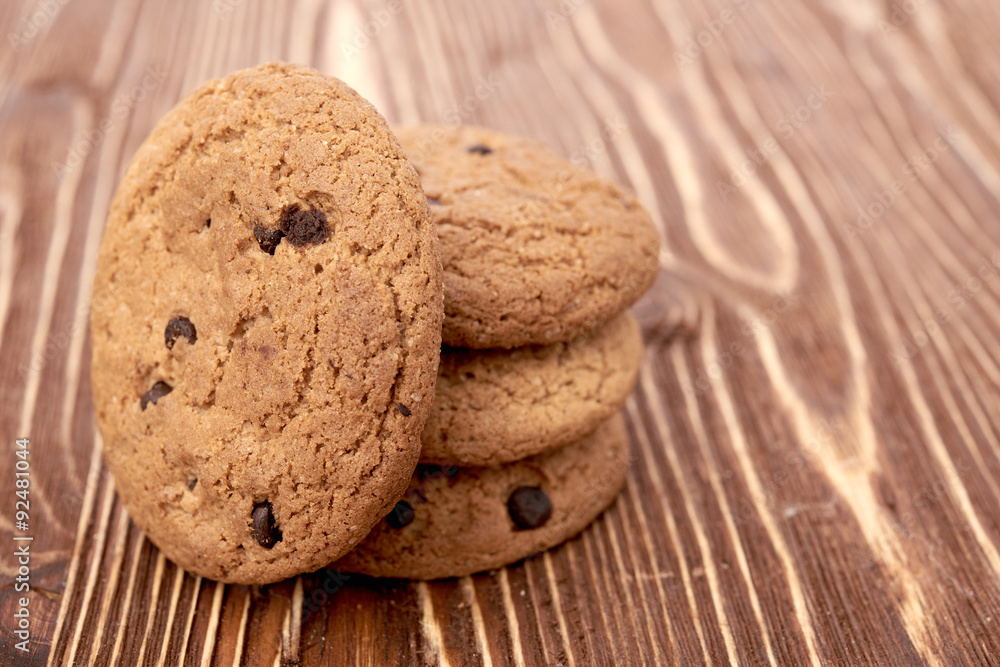 oat cookies on wooden table oat cookies on wooden table