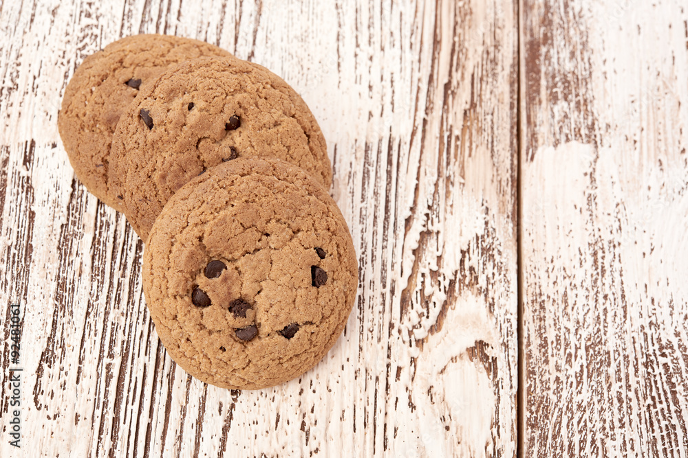 oat cookies on wooden table oat cookies on wooden table