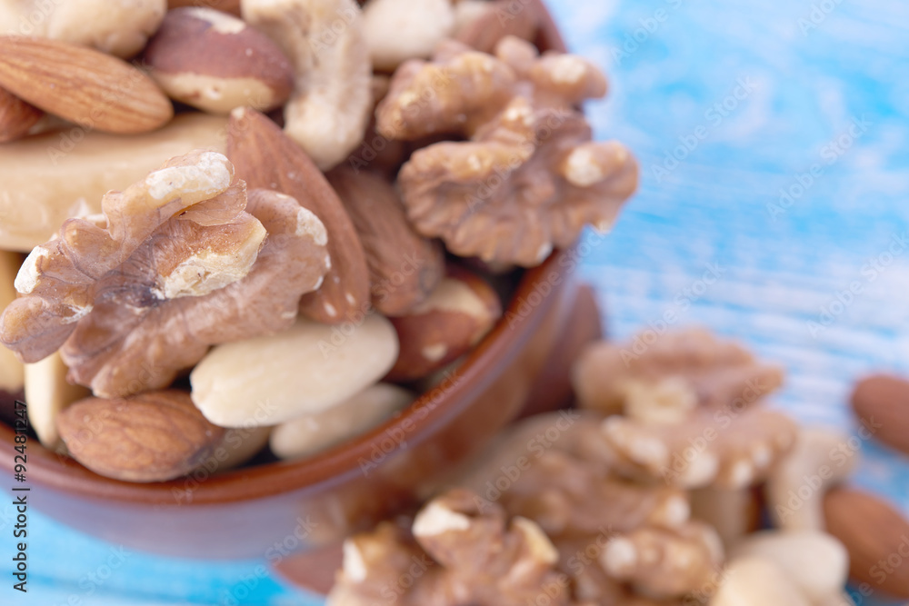 Fototapeta premium Mix nuts on wooden background