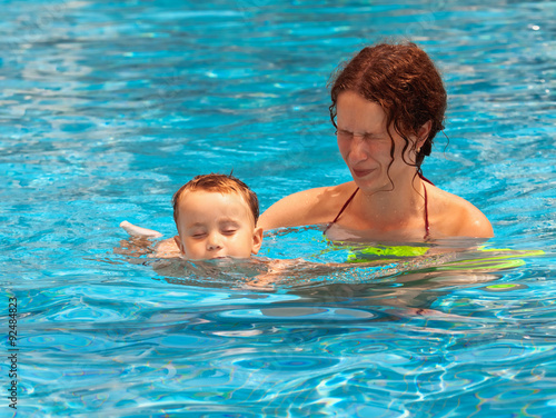 Mother and son swimming in the pool © Kushch Dmitry