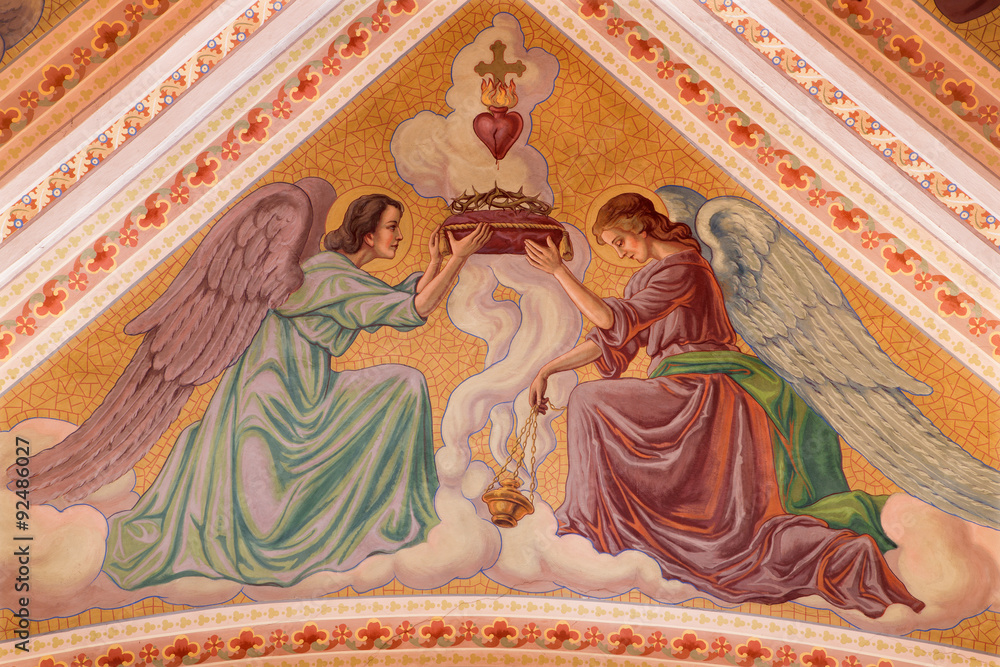 Fototapeta Banska Stiavnica - angels with the symbols of Jesus pain