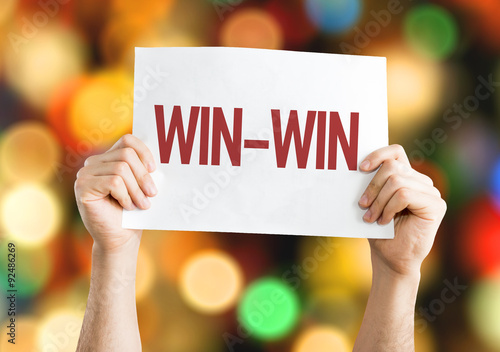 Win-Win placard with bokeh background