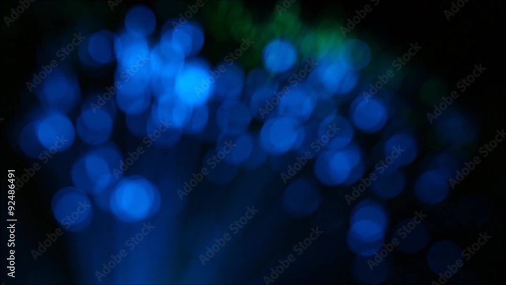 blue and green bokeh background in the dark blue and green bokeh background in the dark