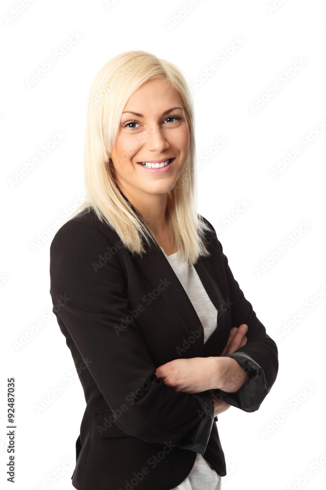 An attractive blonde businesswoman in a black suit standing against a white background. An attractive blonde businesswoman in a black suit standing against a white background.