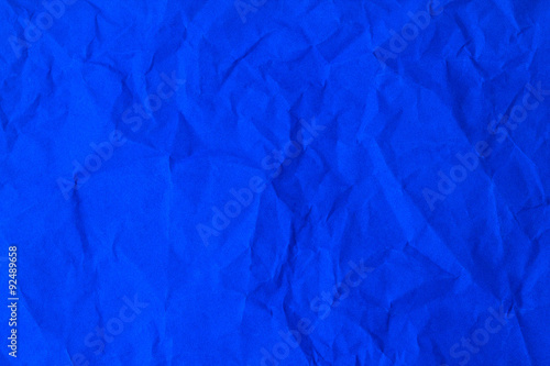 crumpled vibrant blue paper texture