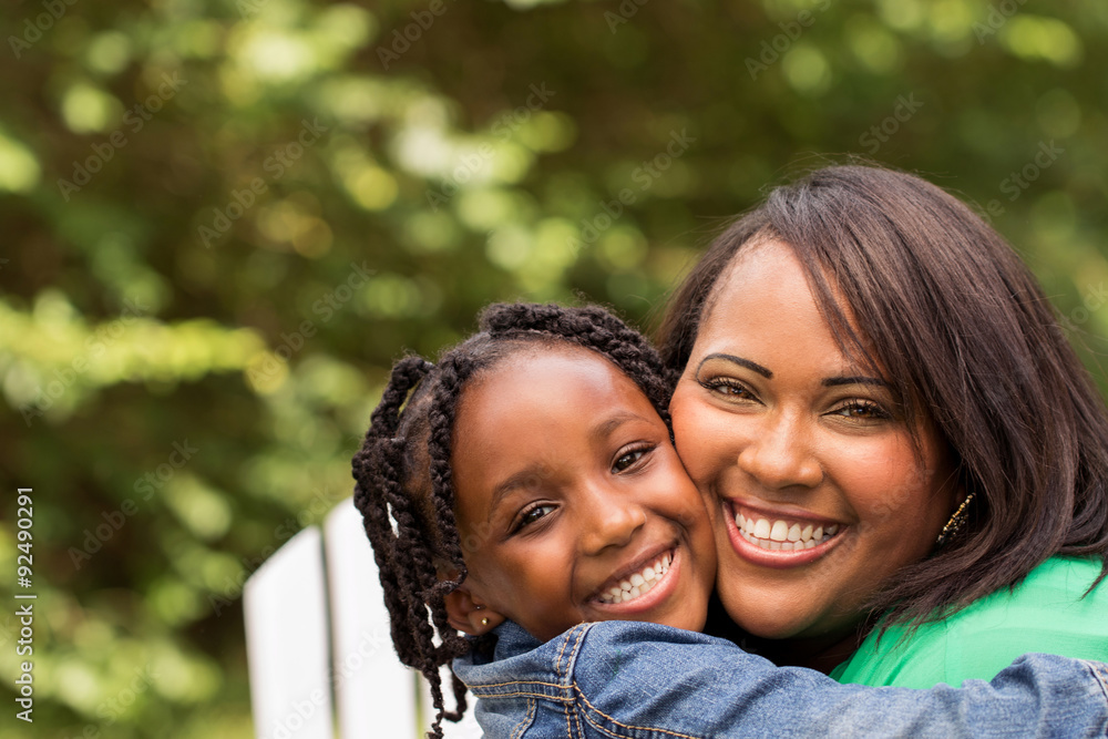 Mother and daughter hugging. Mother and daughter hugging.