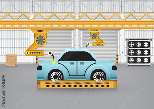 Robots working with auto parts in factory.