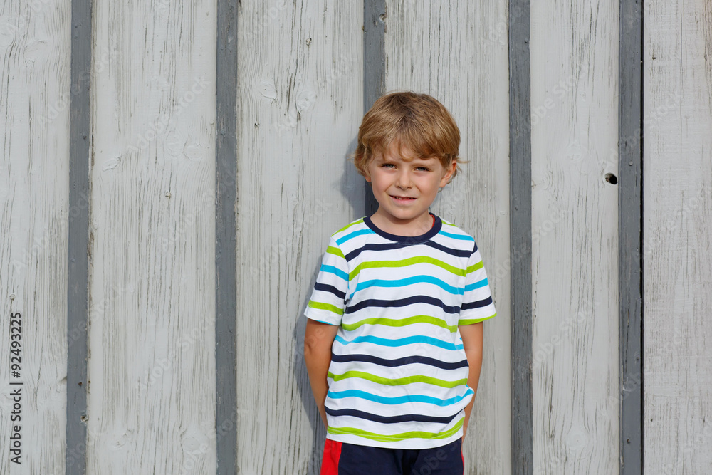 happy little cute kid boy with blond hairs happy little cute kid boy with blond hairs