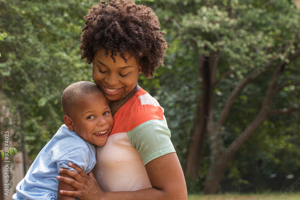 Fototapeta premium African American mother holding her son.