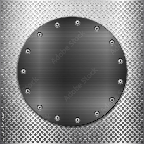 grey metal grid and black circle plate