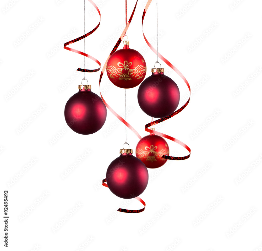 Christmas balls with curly ribbons isolated on the white background Christmas balls with curly ribbons isolated on the white background