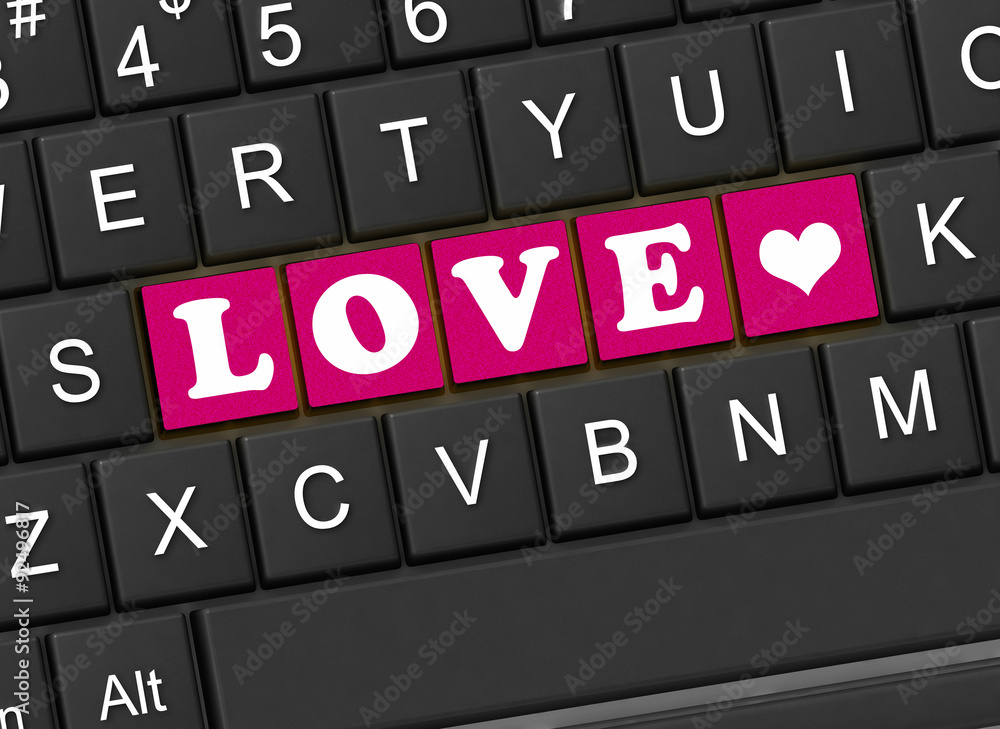 The inscription love on the black keyboard The inscription love on the black keyboard