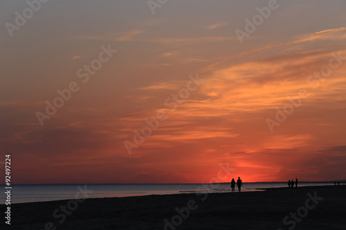 Sunset over beach © idea_studio