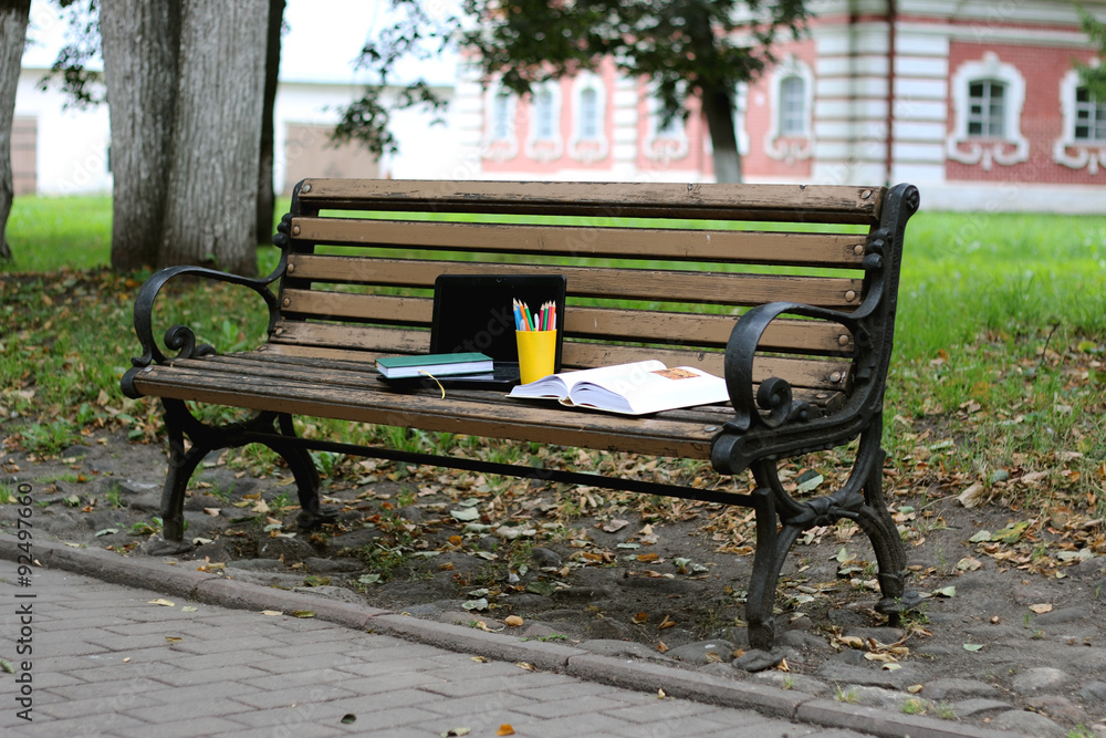 books on a bench in the school year books on a bench in the school year