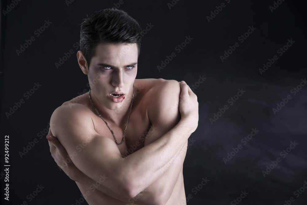 Young Vampire Man Shirtless, Gesturing to Camera Young Vampire Man Shirtless, Gesturing to Camera