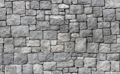 Old gray stone wall  seamless background texture