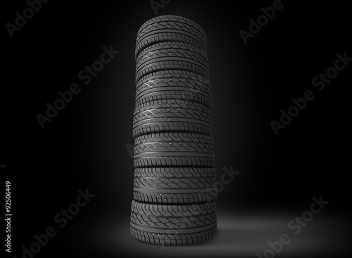 pile of tyres on black