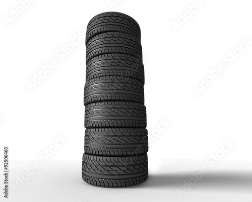 pile of tyres on black