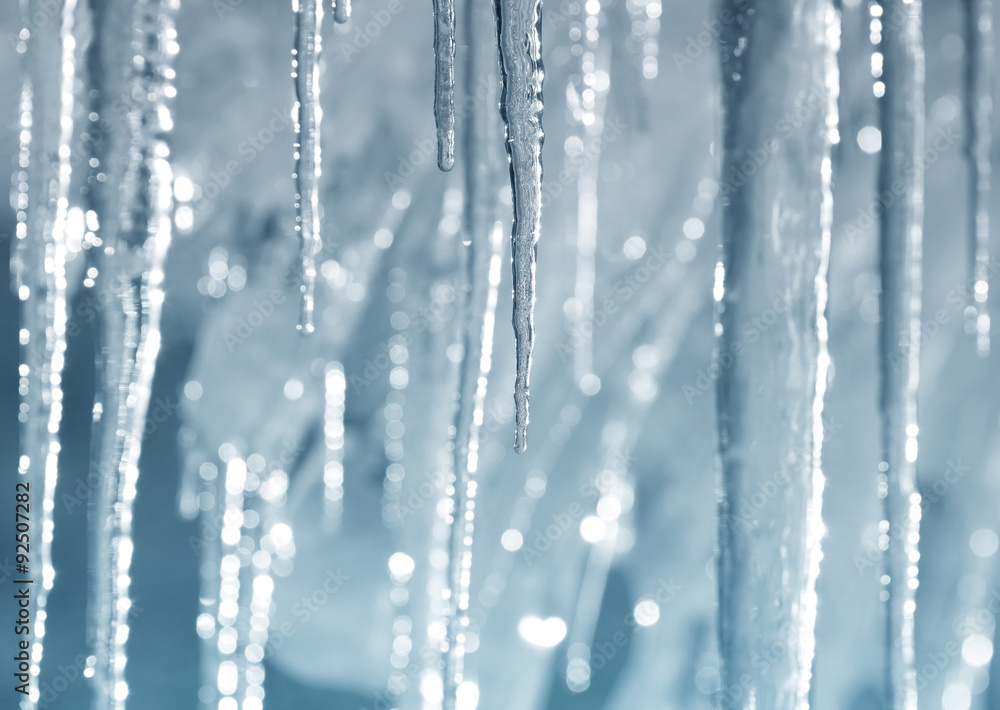 Background of bright transparent icicles in the sunlight - obrazy, fototapety, plakaty 
