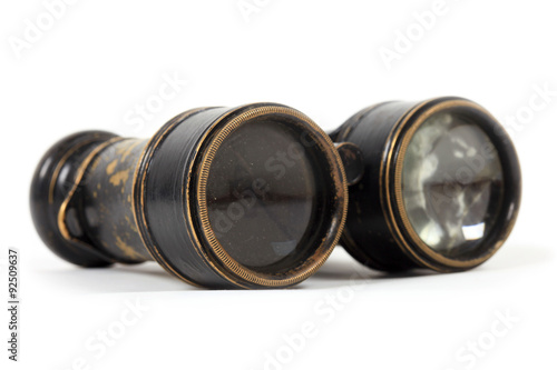 Antique vintage binoculars on a white background