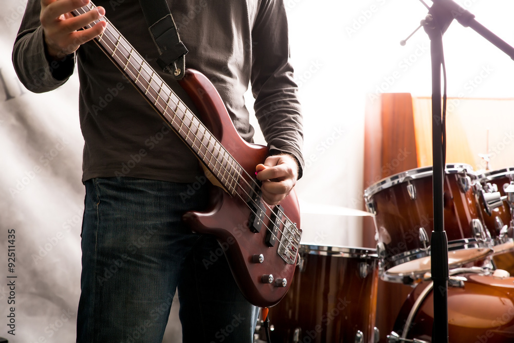 Fototapeta premium Rock singer performing in the rehearsal Studio