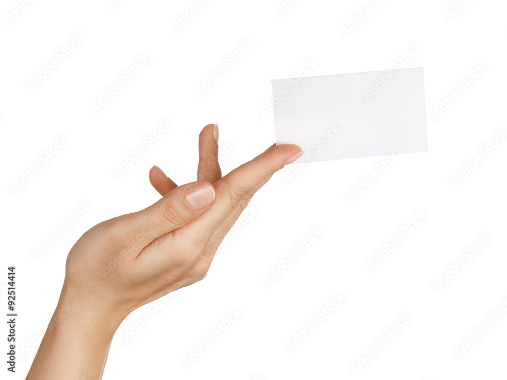 Close up of female hand holding/ giving blank business card Close up of female hand holding/ giving blank business card