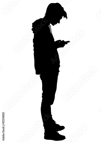 Young man with a phone on a white background