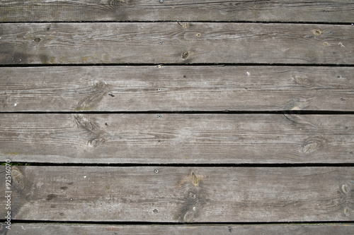 Vintage wooden panel with horizontal planks and gaps