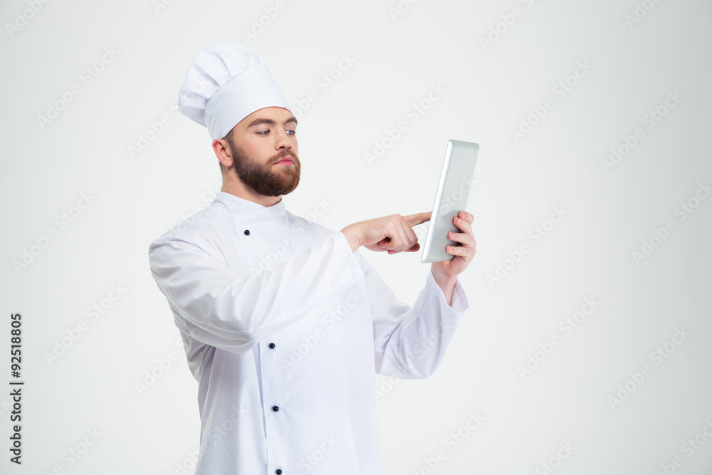 Male chef cook using tablet computer Male chef cook using tablet computer