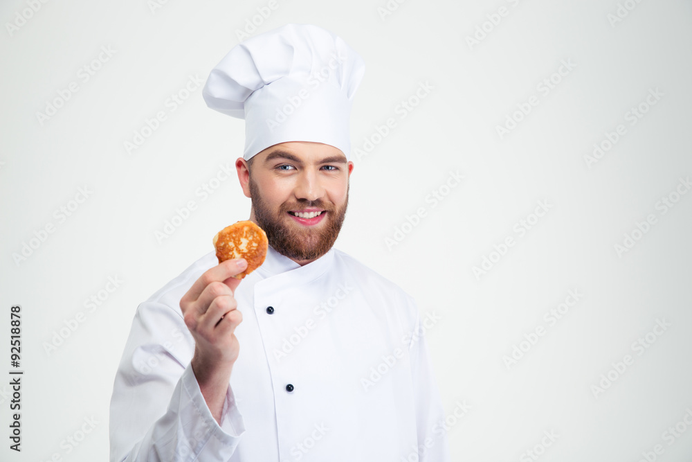 Happy male chef cook holding pancake Happy male chef cook holding pancake