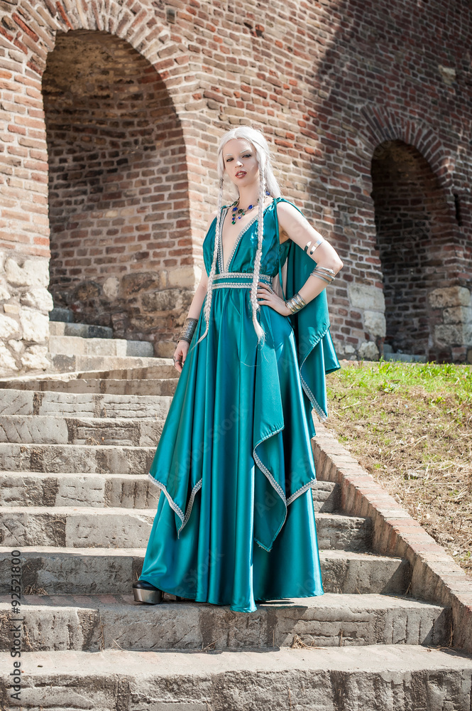 Woman In Medieval Times / Beautiful woman posing on the fortress

