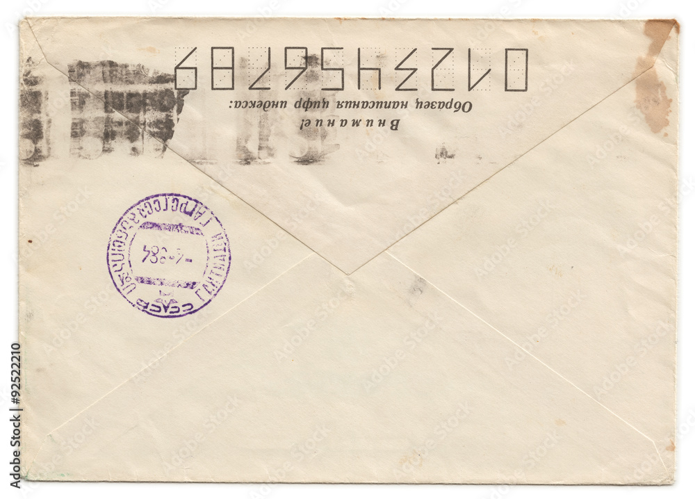 Grunge old envelope with meter stamp isolated n white background