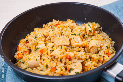 Chicken Breast with Rice and vegetables in a frying pan