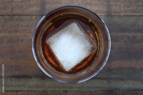 Smokey Joe cocktail on a rustic wooden bar