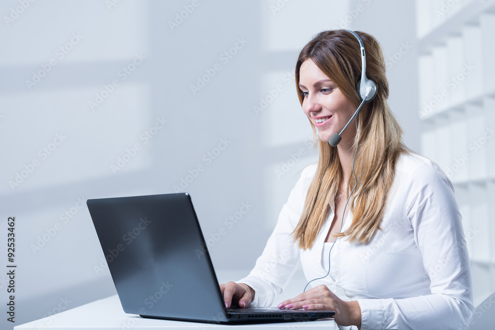 Businesswoman working in call center Businesswoman working in call center