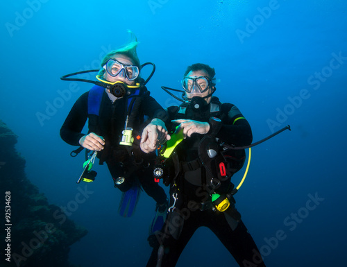 Romantic couple scuba dive together in the ocean © frantisek hojdysz
