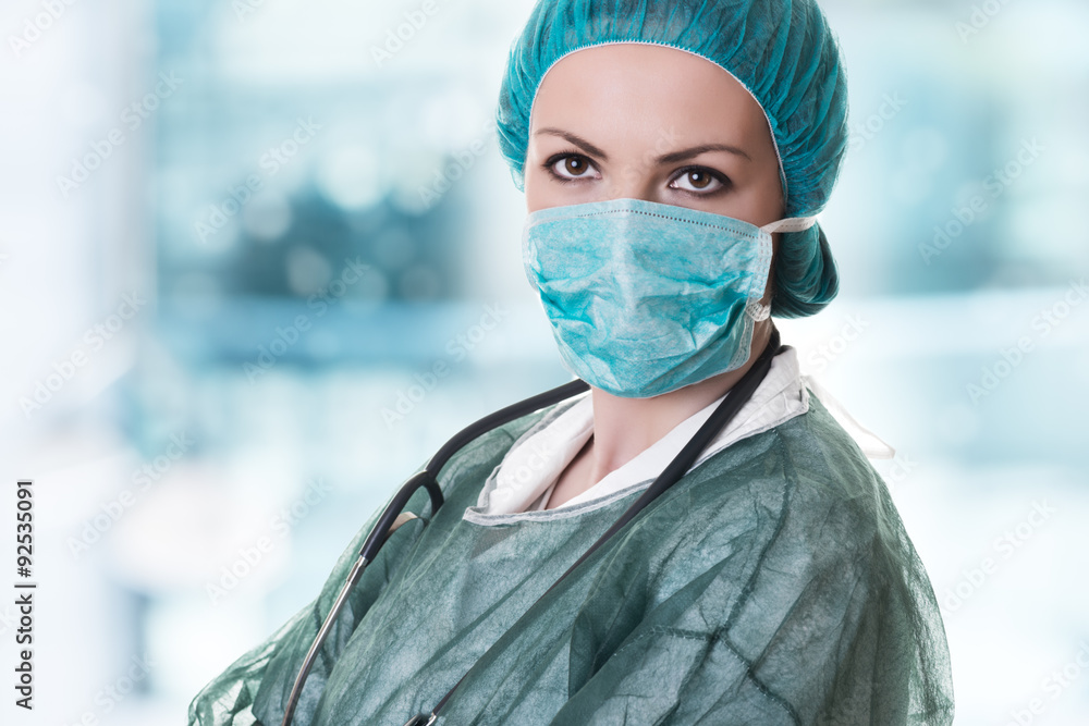 Closeup portrait of female doctor with stethoscope, bonnet and
