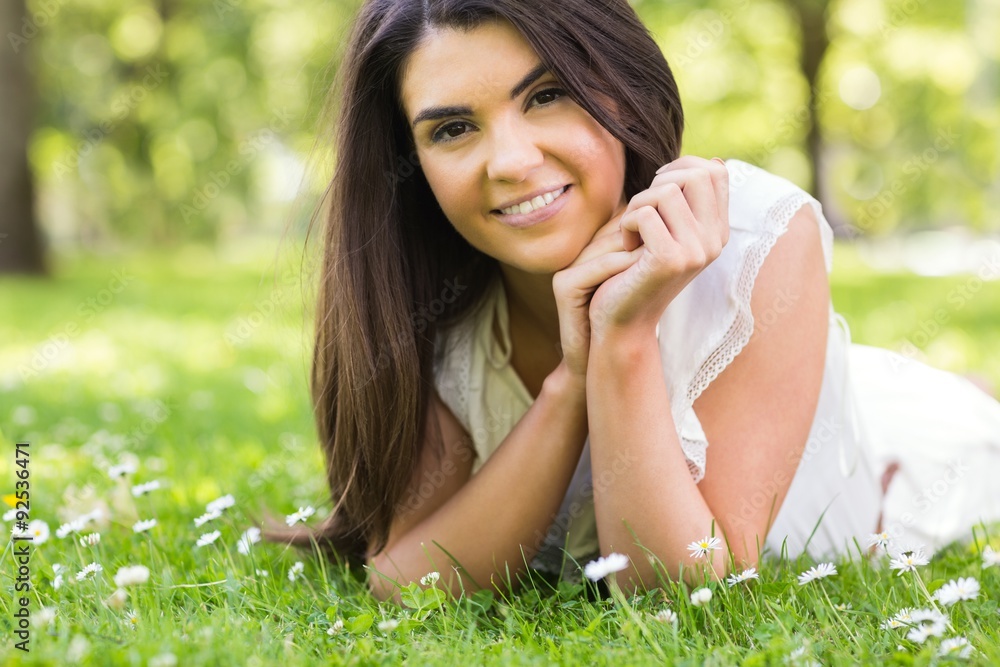 Portrait of pretty woman lying on grassland Portrait of pretty woman lying on grassland